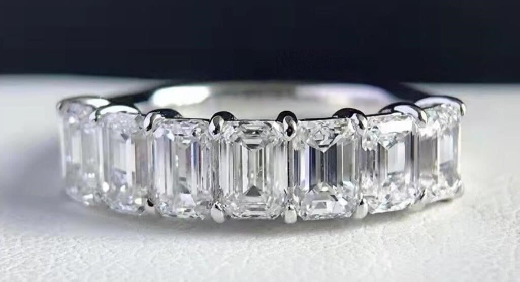 1.4ct Natural Diamond 18K Gold Ring: 18K gold inlaid 1.4cts natural South African high-quality diamonds, shining and dazzling, bright fire, good clarity. Shape: Emerald-cut. Overall condition is excellent. Internationally certified