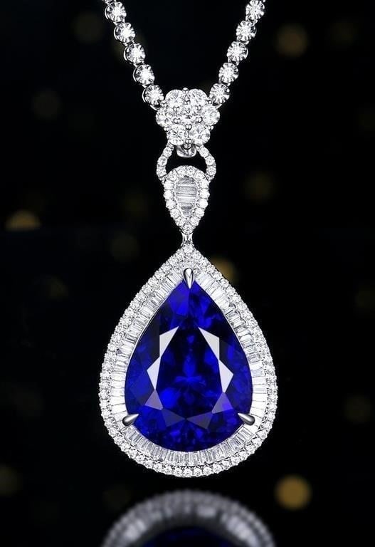 26ct Natural Tanzanite 18K Gold Pendant: 18K gold inlaid with 26ct natural tanzanite and natural South African high-quality diamonds, gorgeous design, attractive style, bright color, clean-crystal, good clarity. Shape: Pear-shaped. Cut: