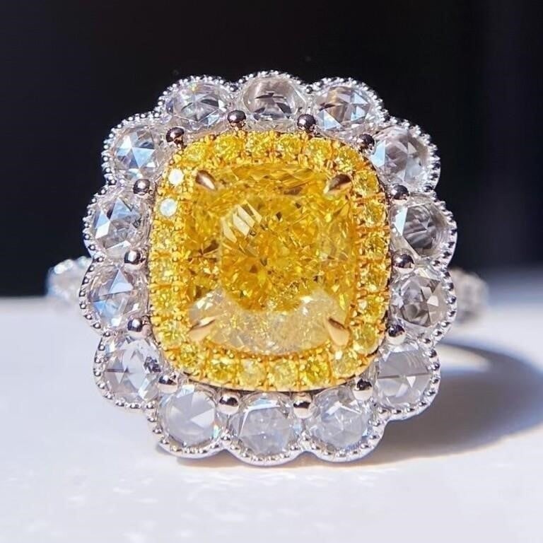 3ct Natural Yellow Diamond 18K Gold Ring: 18K gold inlaid natural South African high-quality diamonds, main stone: 3ct yellow diamond, accessory stone: 1.4cts diamonds. Cushion-shaped yellow diamond adopts excellent cutting technology to