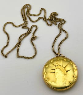 Benrus 18K Yellow Gold Coin Case Pocket Watch with 10K Gold Chain, monogram: Rare Benrus 18K yellow gold mechanical pocket watch monogram on back, featuring a bust of a lady designed in the style of the Statue of Liberty, wearing a 7 pointed crown with the word "SOVEREIGN" eng
