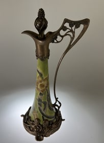 Art Nouveau-style brass-mounted ceramic ewer stamped JBT 1906