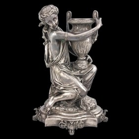 A French silvered bronze figure of a beauty after a model by A. Carrier