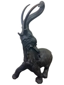 Large detailed Bronze Elephant with raised trunk.