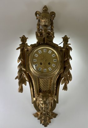 French 19th Century Gilt Bronze Cartel Clock with key