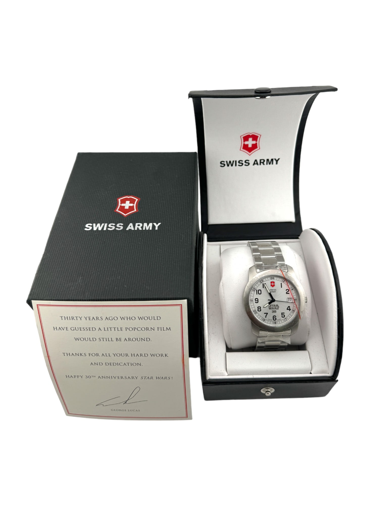 Star Wars Swiss Army Watch Given to Lucasfilm Employees: A gift from George Lucas to employees in recognition of the 30th anniversary of Star Wars in 2007. Never removed from its case. Includes note from George. Provenance from a Star Wars Memorabilia 