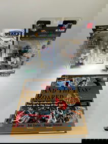 Misc Sports items Incl, Ichiro Bobblehead, Brett Farve Figurine and "And the Fans Roared"