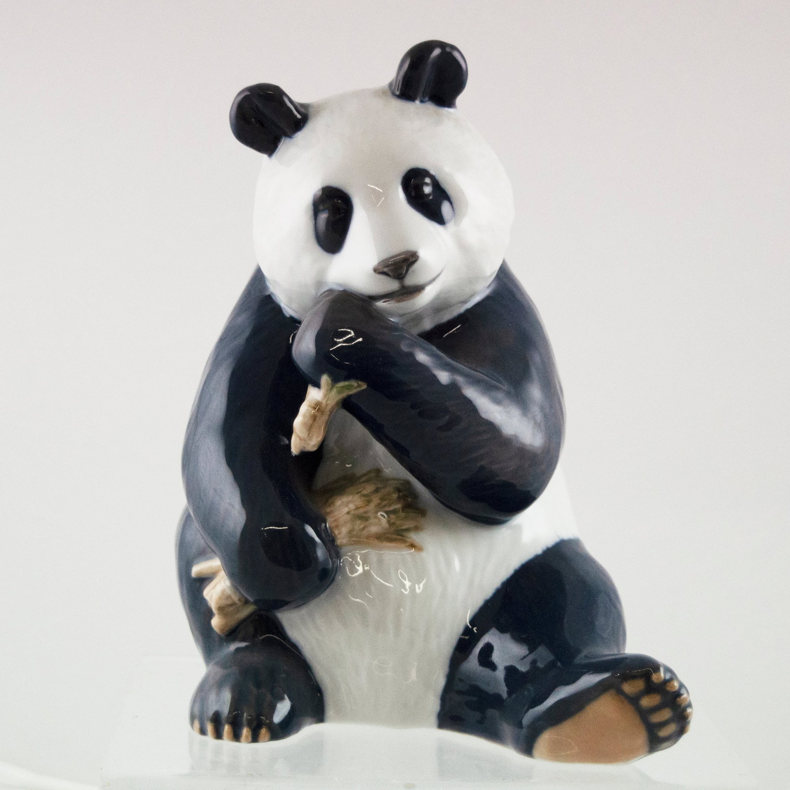 Royal Copenhagen Panda: Vintage Royal Copenhagen large Panda eating bamboo shoot, #662. Great Condition. 4.5" x 4" x 7"