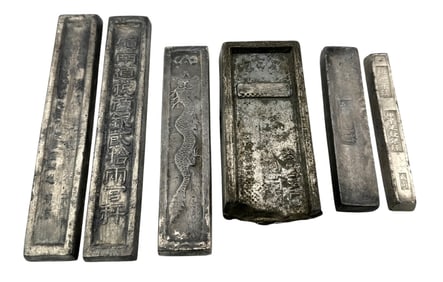 A group of Vintage Metal Bars with Dragon and Chinese Characters