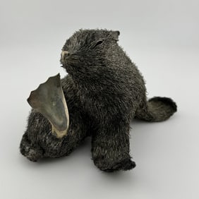 A BUCCELLATI ITALIAN SILVER FIGURE OF A SEAL