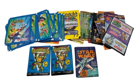 Collection of Unopened Trading Cards and Sticker Packs