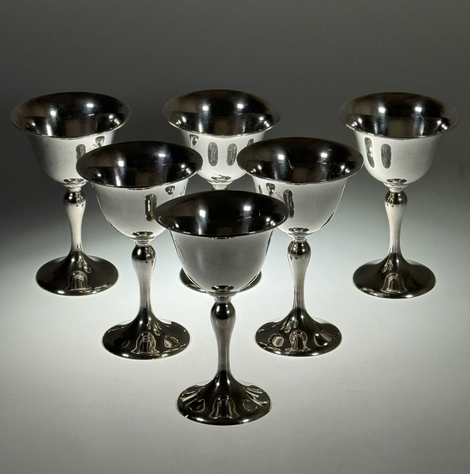 Set of 6 Robert Edwards Sterling Weighed Silver Goblets: Set of 6 Robert Edwards Sterling Weighted Silver Goblets. Stamped " Sterling Weighed" Edwards worked for Shreve & Co and then opened his own shop in Oakland, CA. Height 4.5". Monogrammed. Total W