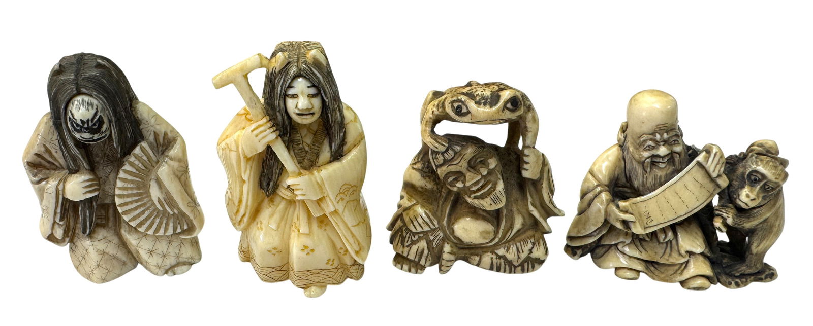 Lot of Four Japanese Bone Carved Netsuke including Rotating Face Kabuki (1 of 4)