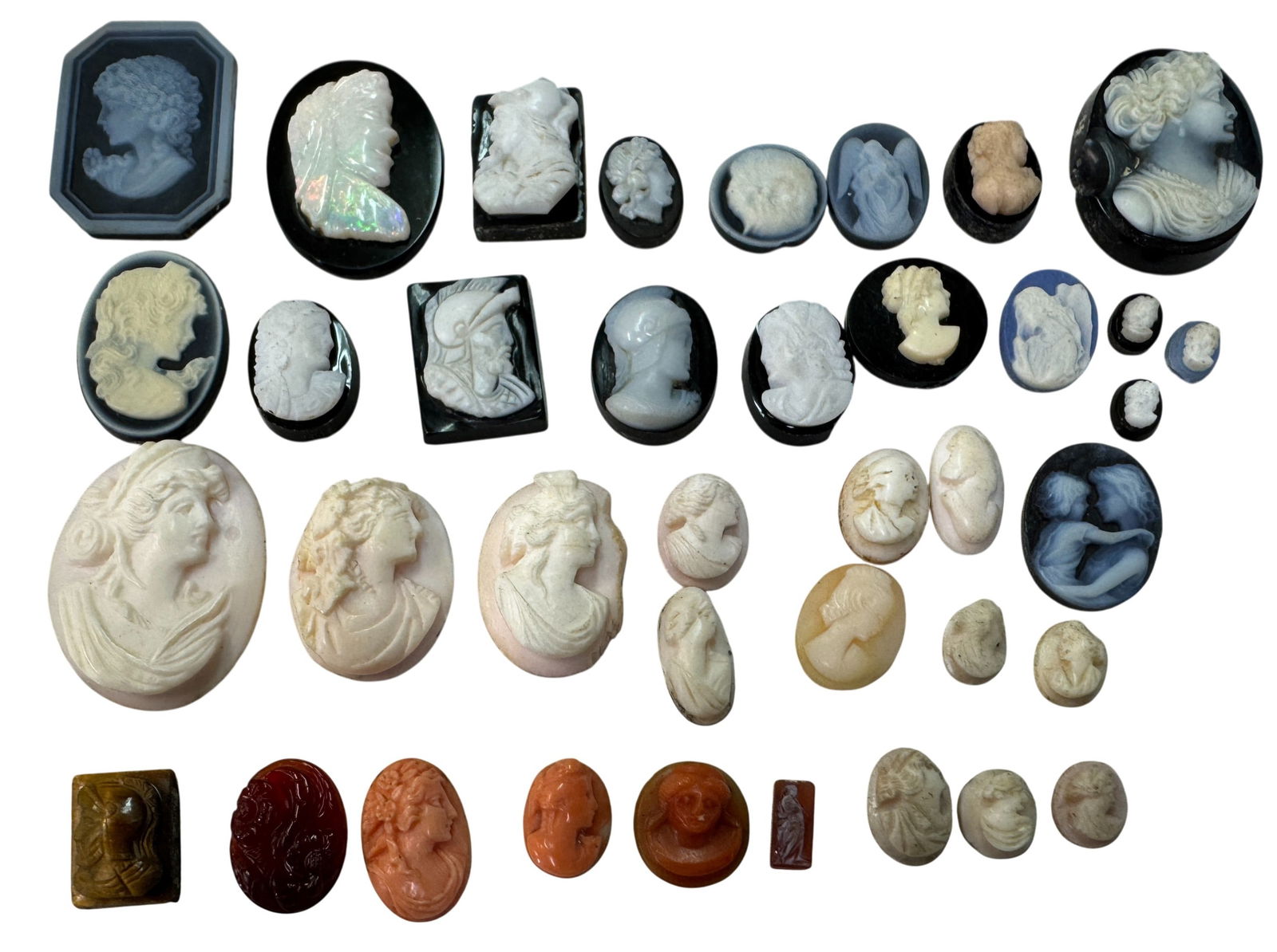 Collection of Onyx and Pink Shell Cameos: Collection of Onyx and Pink Shell Cameos. Largest piece is 1.25" x 1" j/m