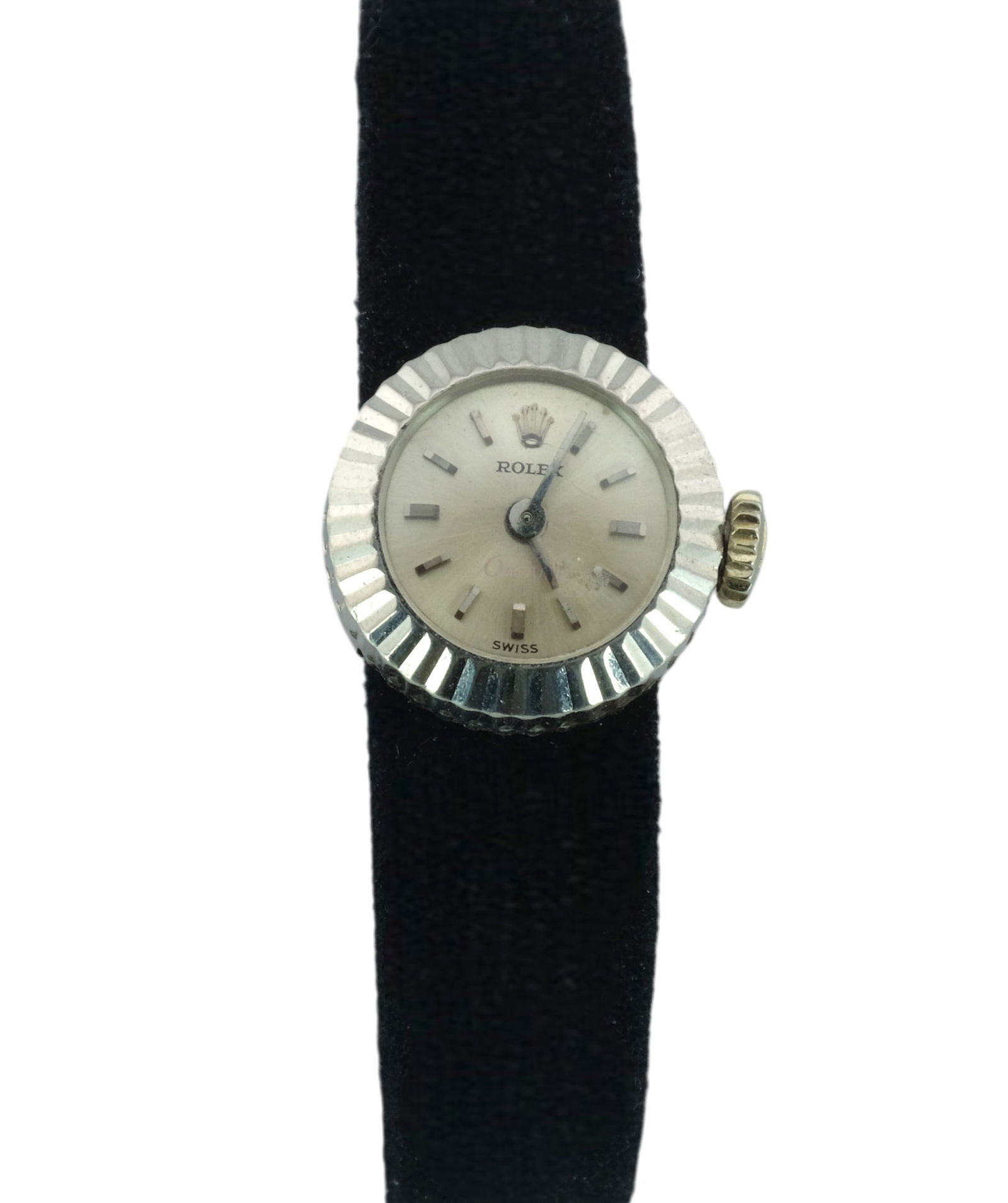 Vintage 1960s Rolex Chameleon Orchid 18K White Gold: Vintage 1960s Rolex Chameleon Orchid 18K White Gold with Manual Movement. Case is 16mm with black rolex band and rolex gold plated buckle. Comes with extra Gold plated metal band. Fit wrist size up to