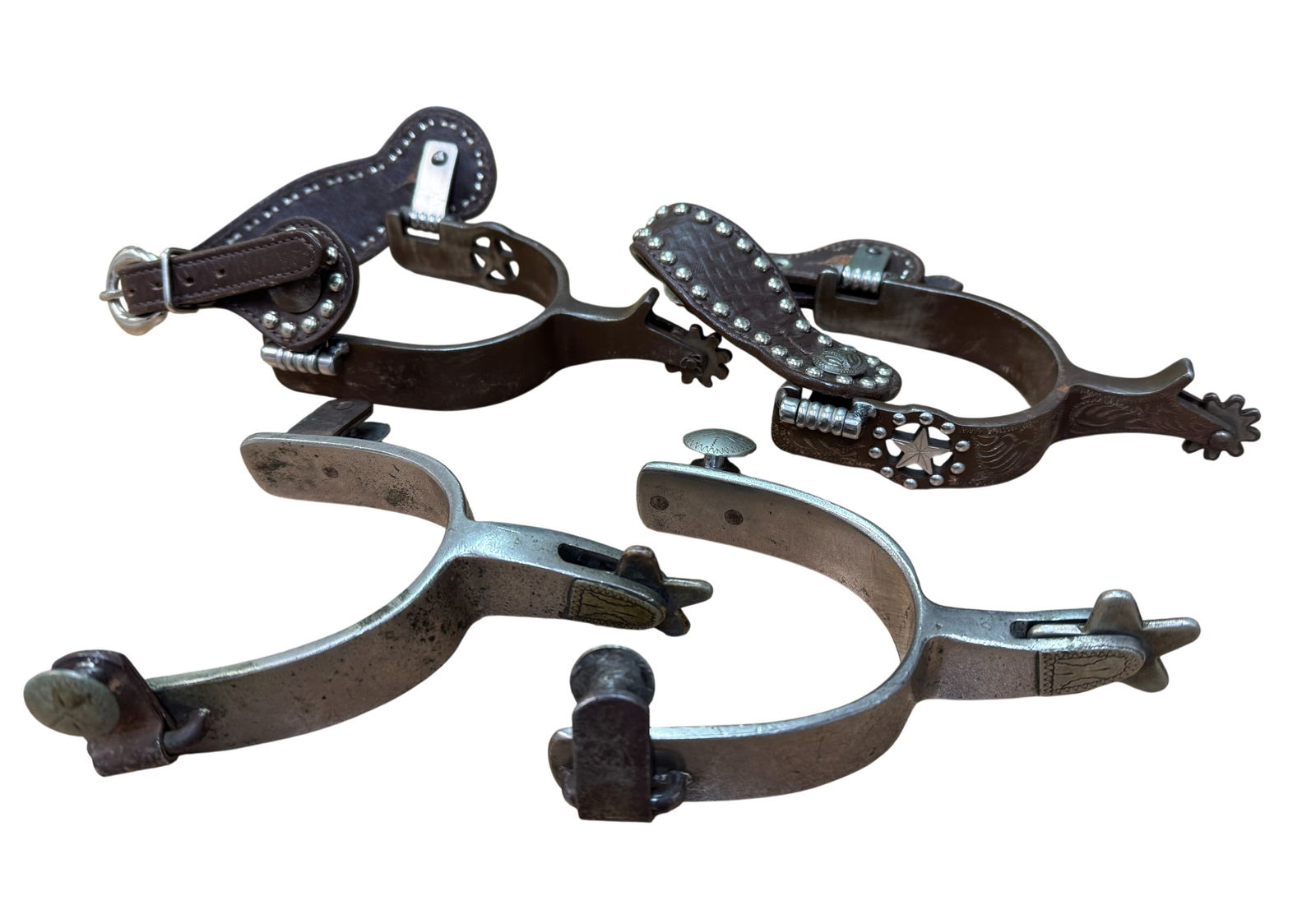 Lot of Four Western Riding Spurs including Crockett: Lot of Four Western Riding Spurs including Crockett.