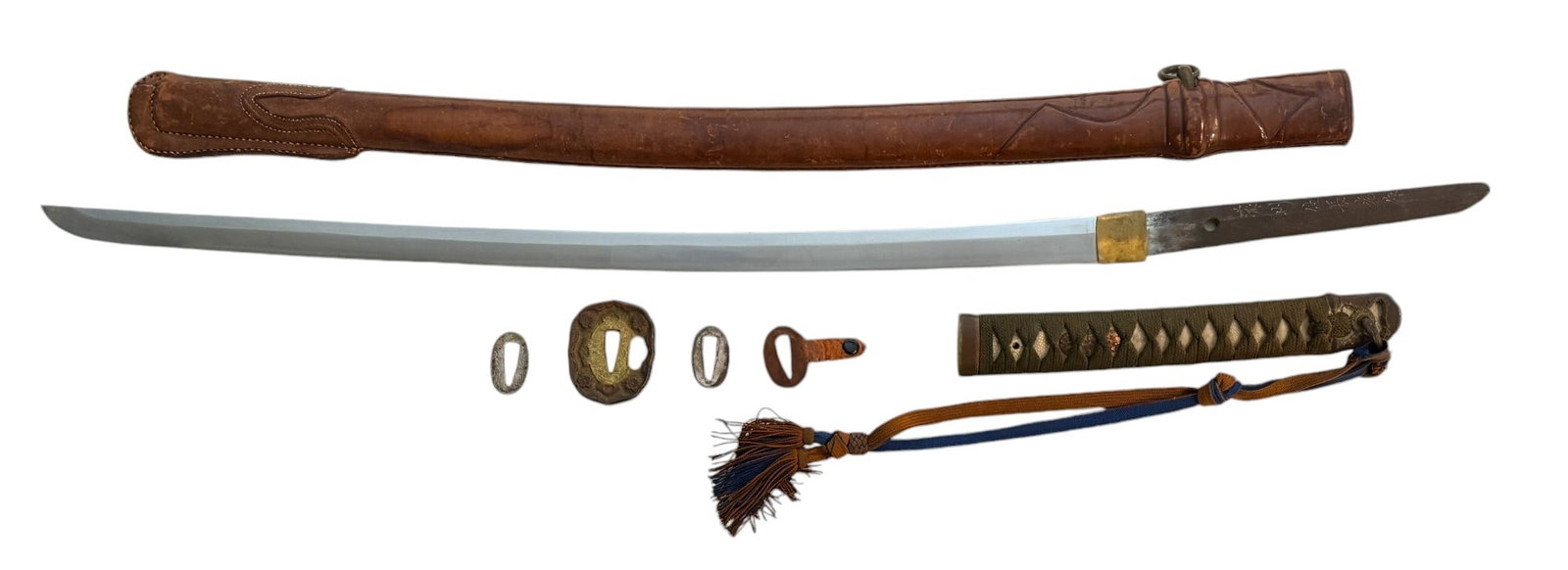 WWII Japanese Officer's Shin Gunto with Rare Cover, Signed "No Shu Ju Kawasaki Nagamitsu saku": WWII Japanese Officer's Shin Gunto with Rare Cover, Signed "No Shu Ju Kawasaki Nagamitsu saku." The tang has a Seki stamp of Showato, single gold tone copper hibaki, ray skin Tsuka with original tassl