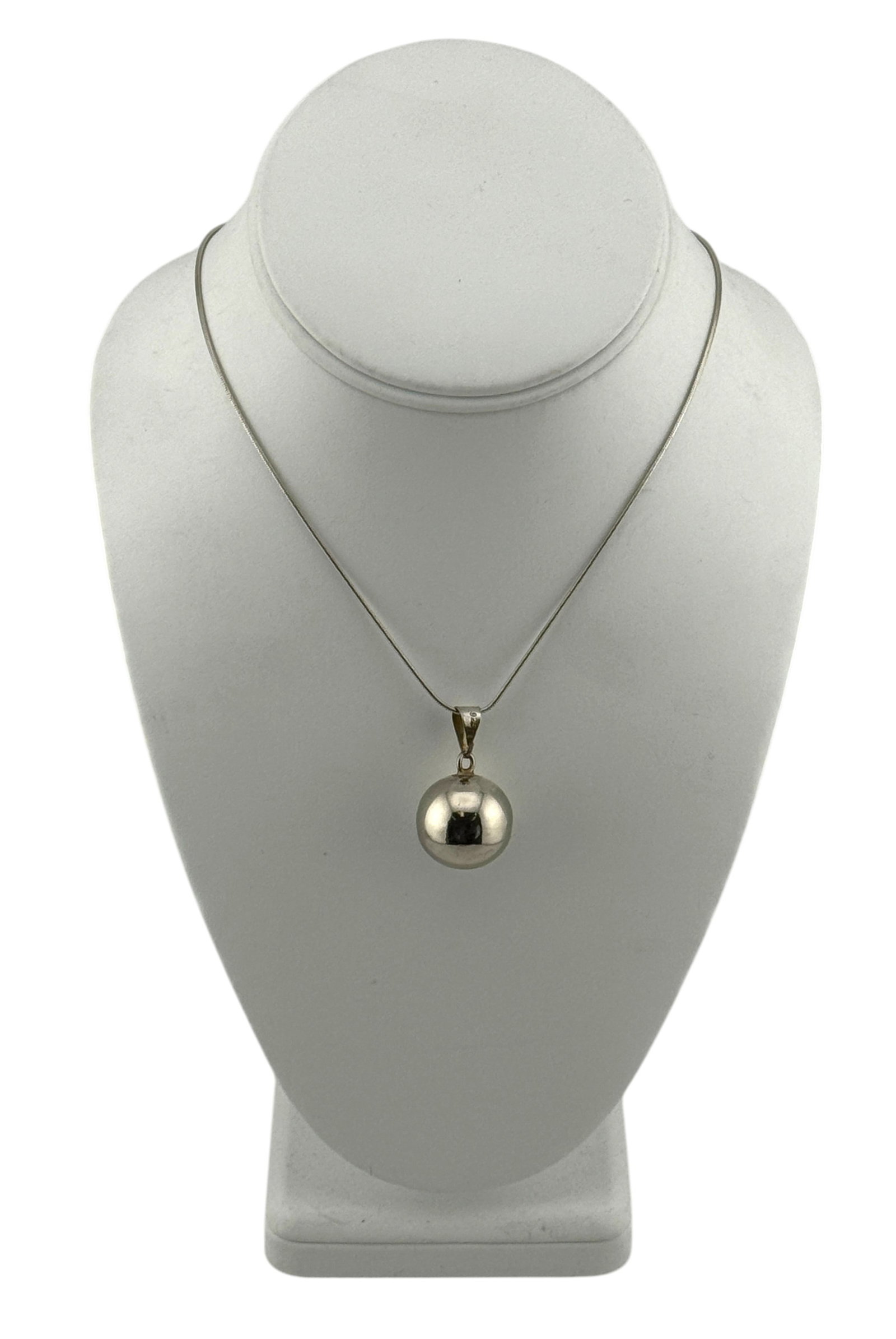 Sterling Silver Necklace with Ball Charm: Sterling Silver Necklace with Ball Charm. Marked "925." Length 17" and weights 10 grams