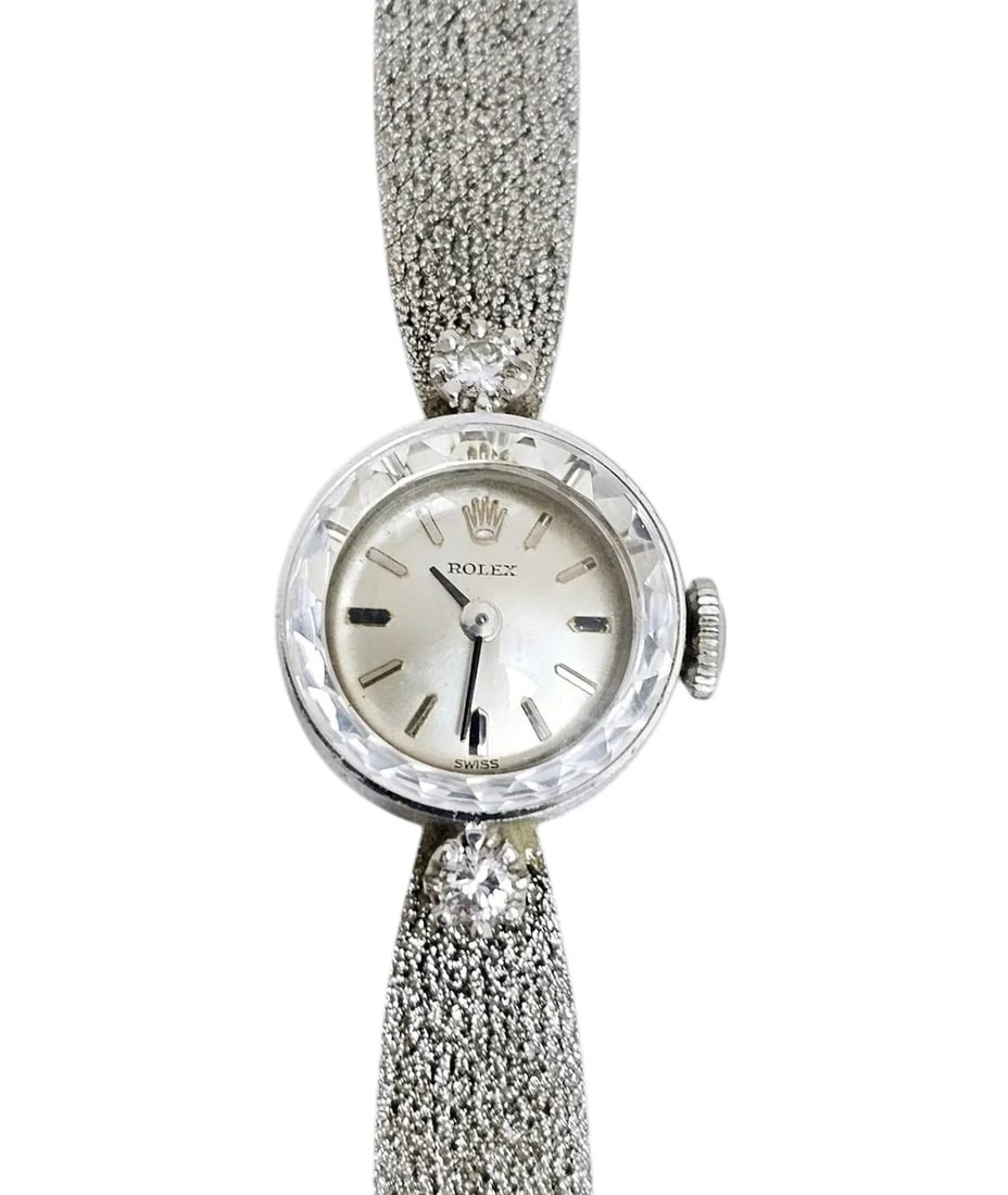 Ladies Rolex Diamond, 14K Gold Wristwatch: Ladies Rolex Diamond, 14K Gold Wristwatch. DIAL: Round, silvered, applied silver and black baton hour markers, Rolex, Swiss. MOVEMENT: Manual wind, seventeen (17) jewels, unadjusted, caliber 1400, Rol