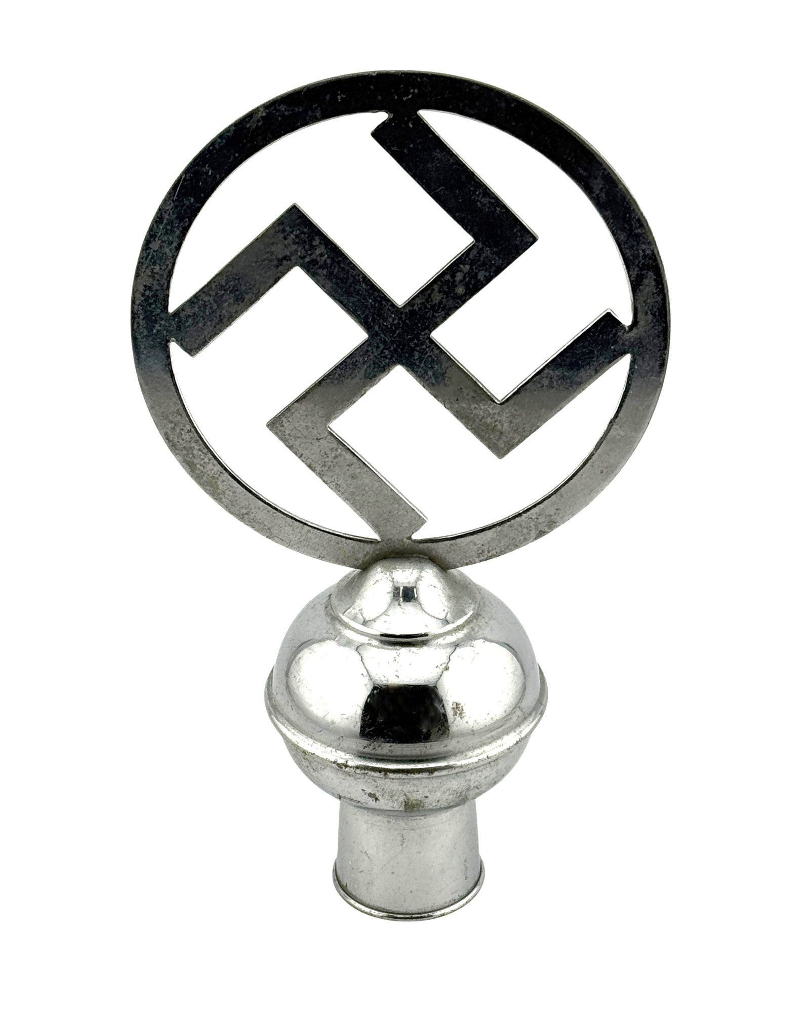 WWII German NSDAP Political Pole Finial: Constructed of plated non-magnetic metal, consisting of a circular ring surrounding a mobile swastika on a hollow background, set atop a rounded pedestal which transitions into a hollow stand flanked