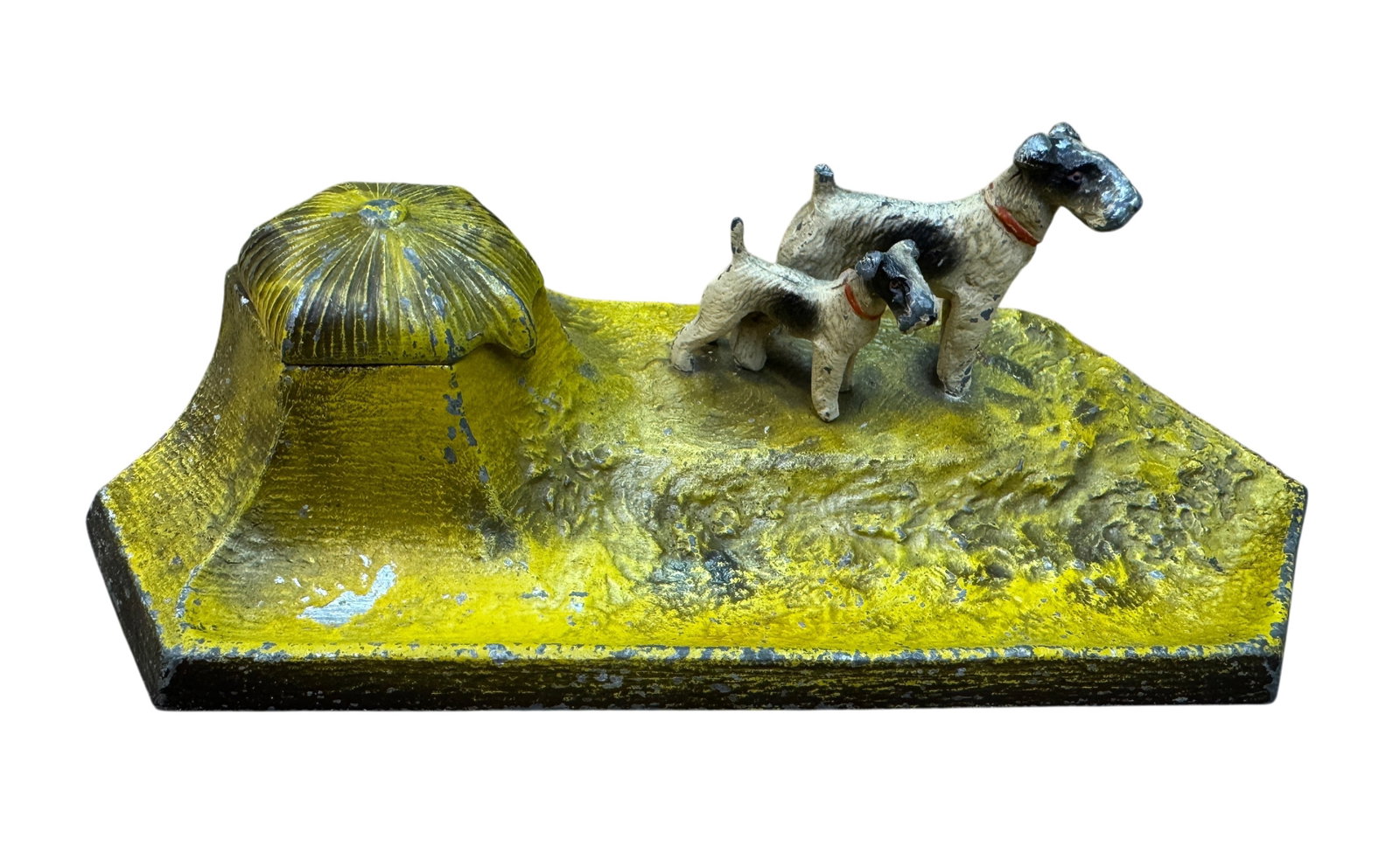 Cast Iron Terrier Inkwell: Vintage Hubley-styler cast iron inkwell and pen holder with original ink glass liner. Minor paint loss as expected for age. 7.75" x 3.75".