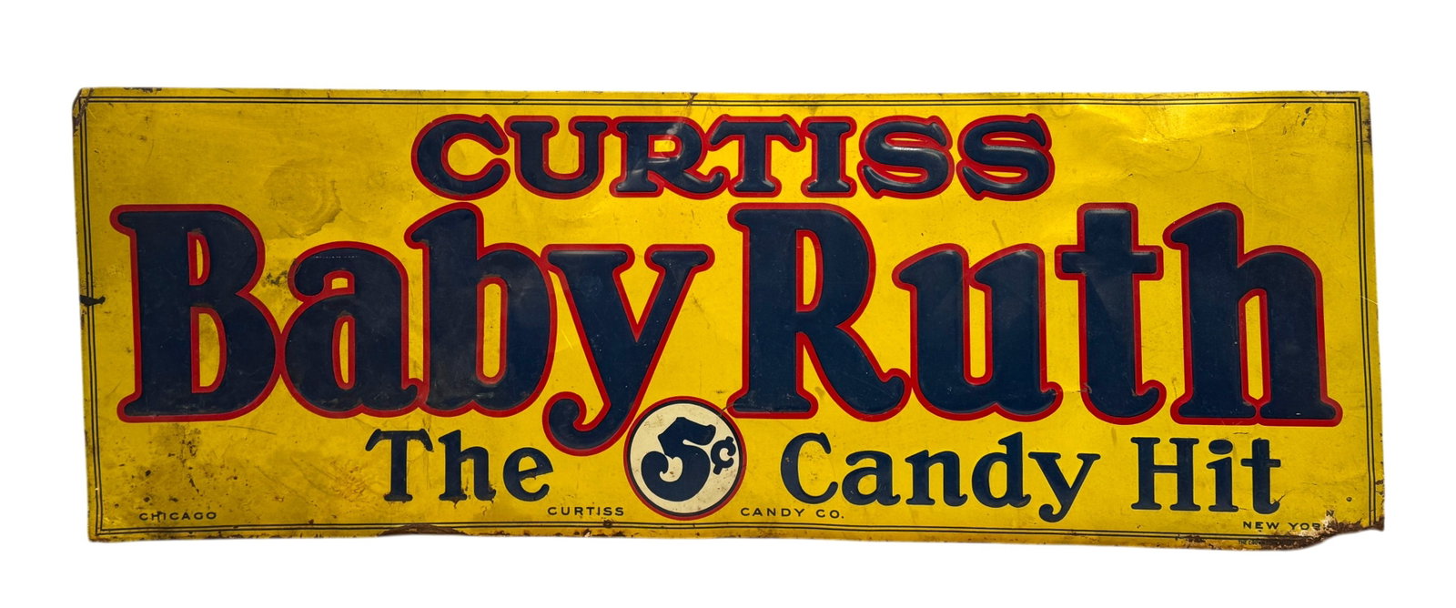 1920s Curtis Baby Ruth 5 Cents Tin Candy Ad Sign: 1920s Curtis Baby Ruth 5 Cents Tin Candy Ad Sign. The sign features yellow background with blue and red lettering. Dimension 28" x 10." Condition: Rust, some paint and metal loss.