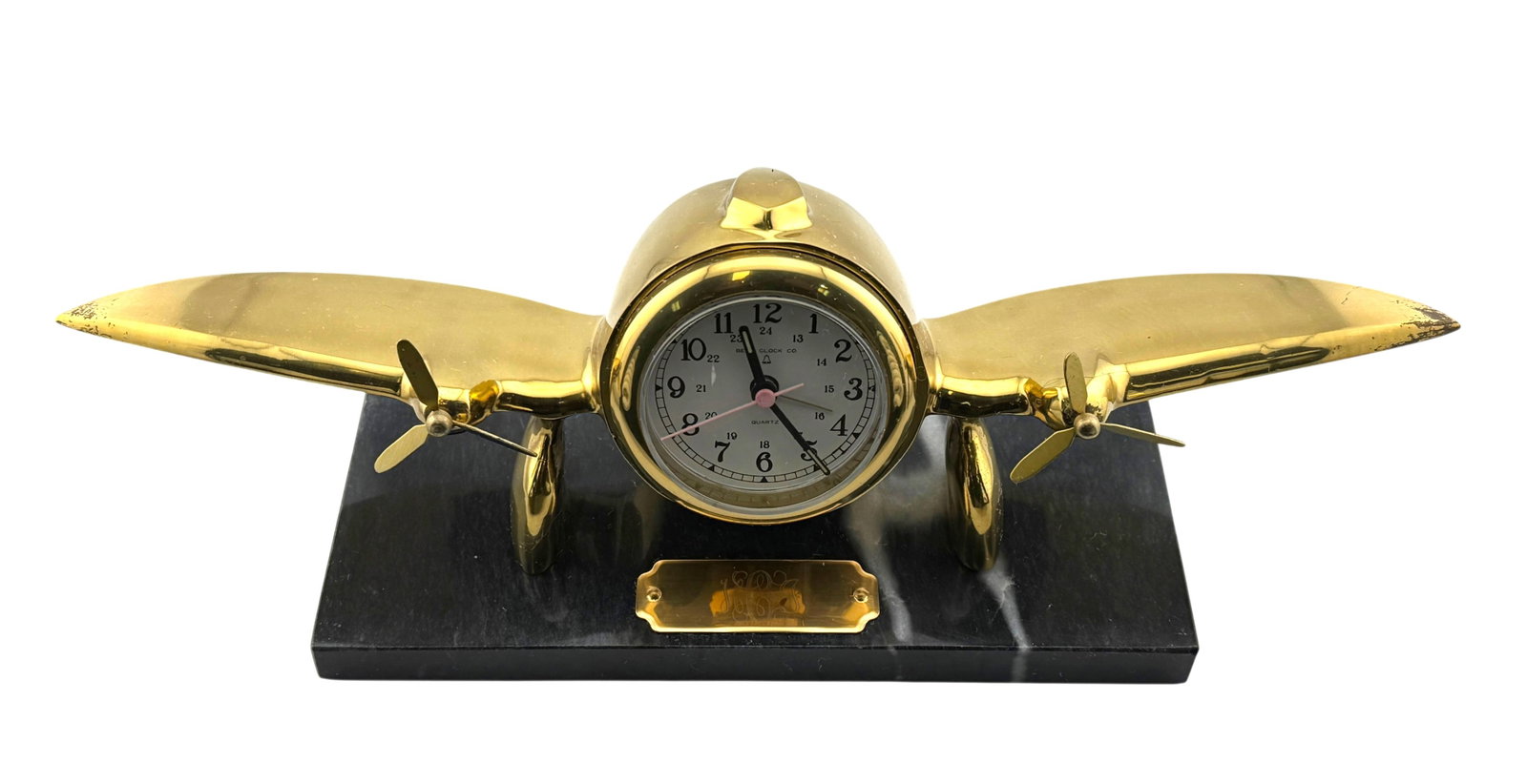 Vintage Mid Century Brass and Marble Propeller Clock by Bell Clock Co.: Vintage Mid Century Brass and Marble Propeller Clock by Bell Clock Co. Condition: Currently not running. Rust on edge of wings. Dimension: 13" x 3.5" x 5"