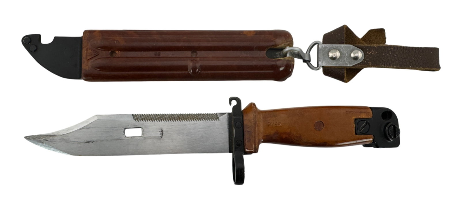 Russian Type II AKM / AK47 Knife Bayonet with Scabbard: Soviet Russian AKM Type II Bayonet with wire-cutting Scabbard. For use with the 7.62 mm & 5.45 mm Kalashnikov AKM assault rifle. The 6x4 bayonet was produced from the late 1960s to 1983 at the Izhevsk