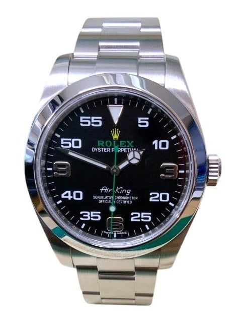 Rolex Air-King 116900 Silver Oyster Bracelet with Box and Warranty Card C. 2019: This pre-owned Rolex Air-King ref. 116900 (2019) features a 40mm Oystersteel case with a smooth bezel and a bold black dial highlighted by large Arabic numerals, a green seconds hand, and the