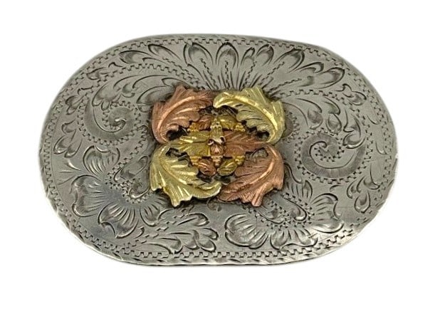 Black Hills Sterling Silver Belt Buckle with 10k Tri-Color Gold Leaf Center: Black Hills Sterling Silver Belt Buckle with 10k Tri-Color Gold Leaf Center. Stamped "Black Hills Gold JCO." Dimension 3" x 2.25" and weiht 52.48 grams