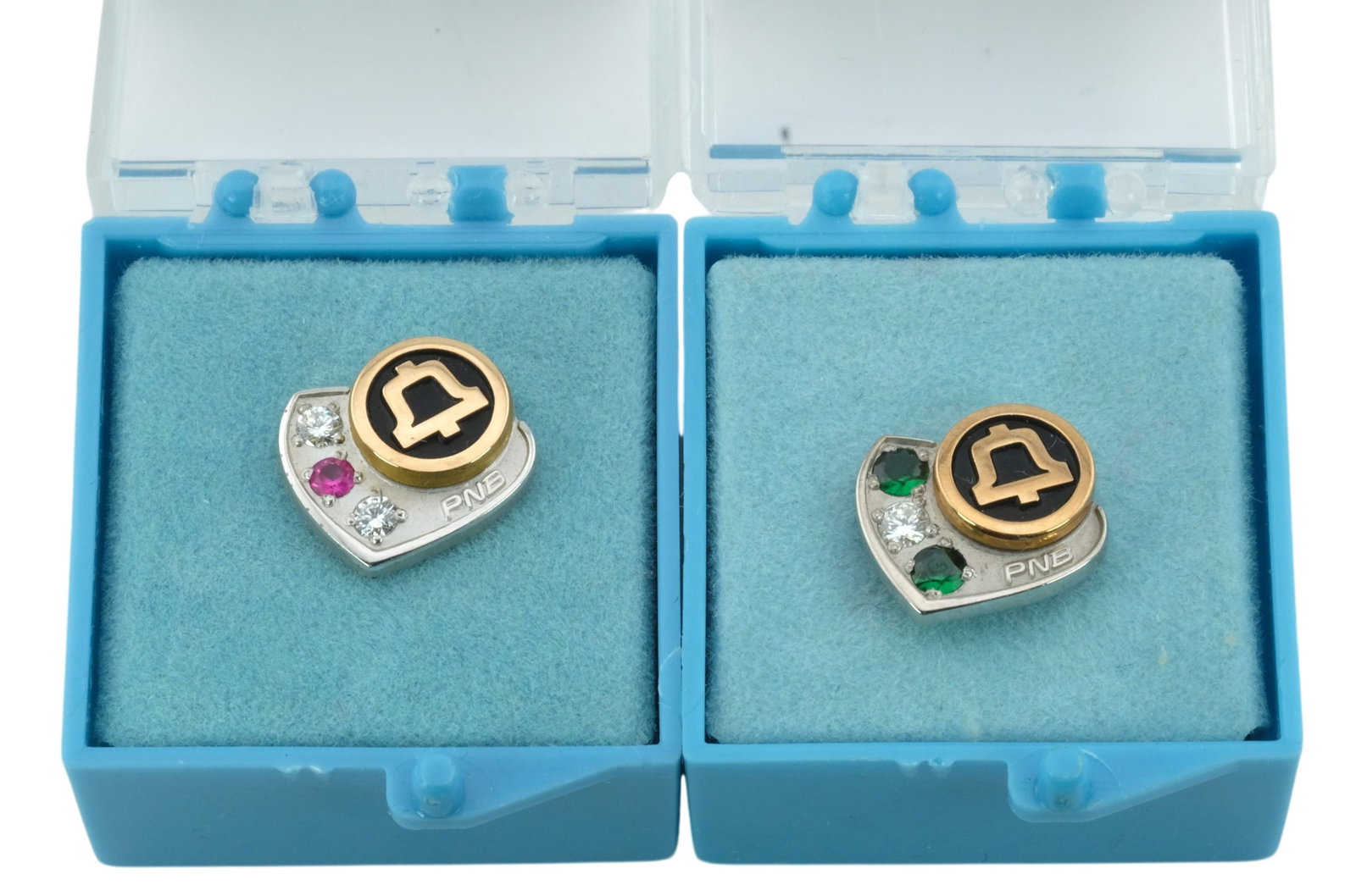 Lot of 2 Vintage Bell Telephone Company 10Kt Gold and 10Kt Gold Filled, Diamond and Ruby Pins.: Lot of 2 Vintage Bell Telephone Company 10Kt Gold and 10Kt Gold Filled, Diamond and Ruby Pins. Pin with Red Ruby and Diamond marked " 1/5 10Kt" and pin with green ruby and diamond marked "10K CTO."