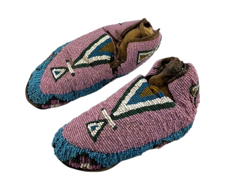 Native American Sioux Beaded Moccasins: Native American Sioux Beaded Moccasins. Condition: loss beads and tear on leather underneath.