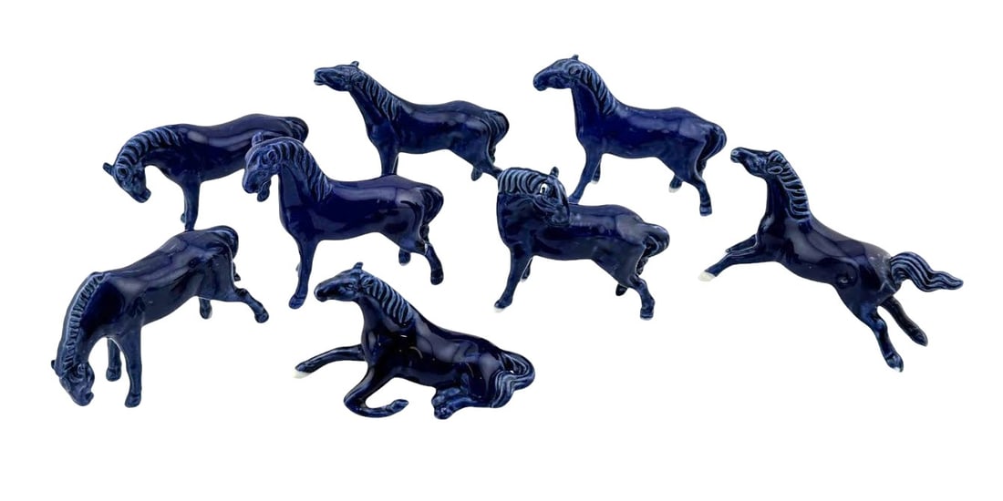 Lot of 8 Vintage Spanish Blue Cobalt Ceramic Horses C. 1970s: Lot of 8 Vintage Spanish Blue Cobalt Ceramic Horses C. 1970s. Dimension: 3.5" x 1" x 2.5." Condition: One horse with repair on leg, one with damage to ear. Please see picture. A/R