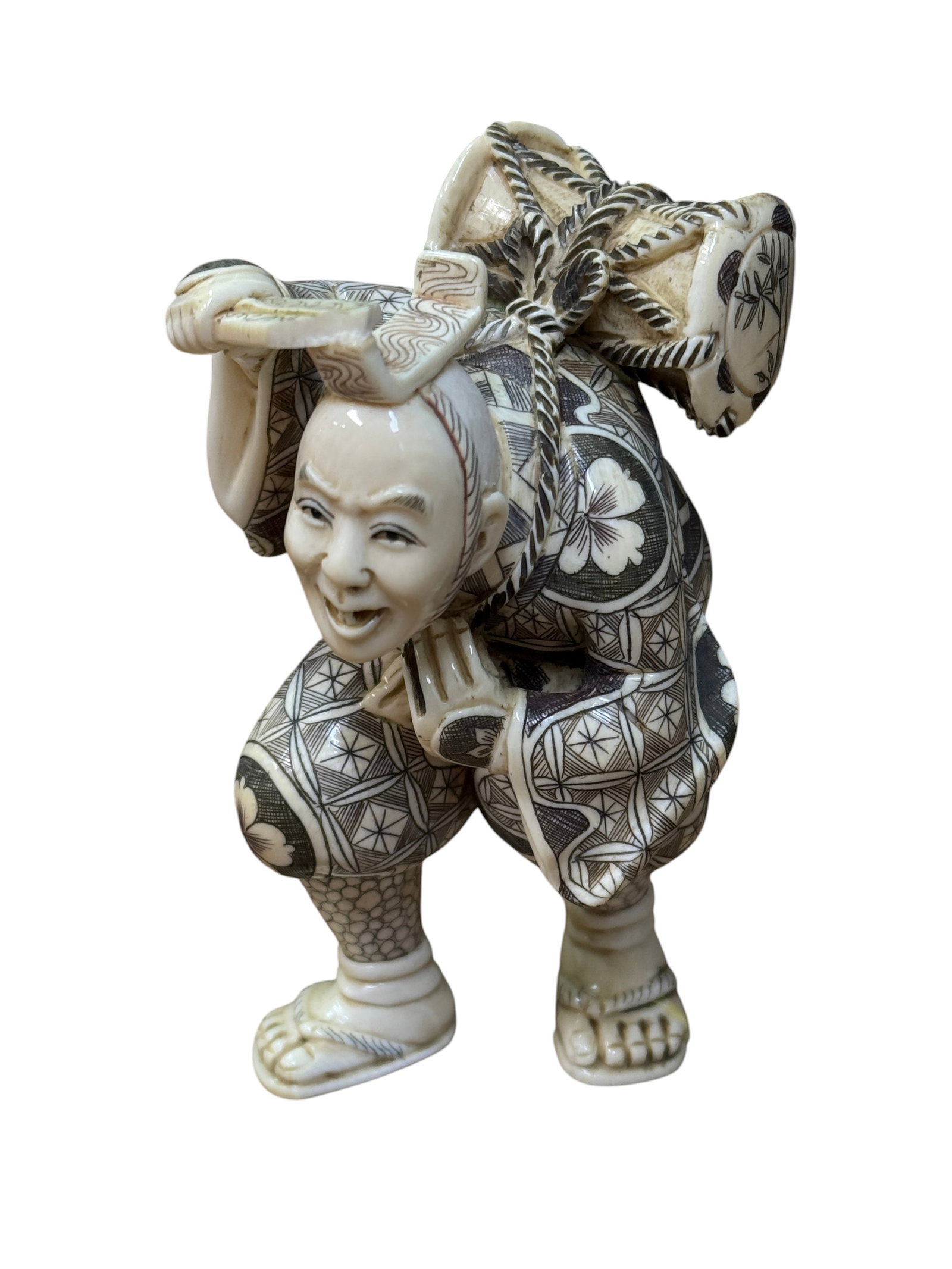 19th Century Japanese Carved Okimono Figurine of Man Carrying Drum (1 of 5)