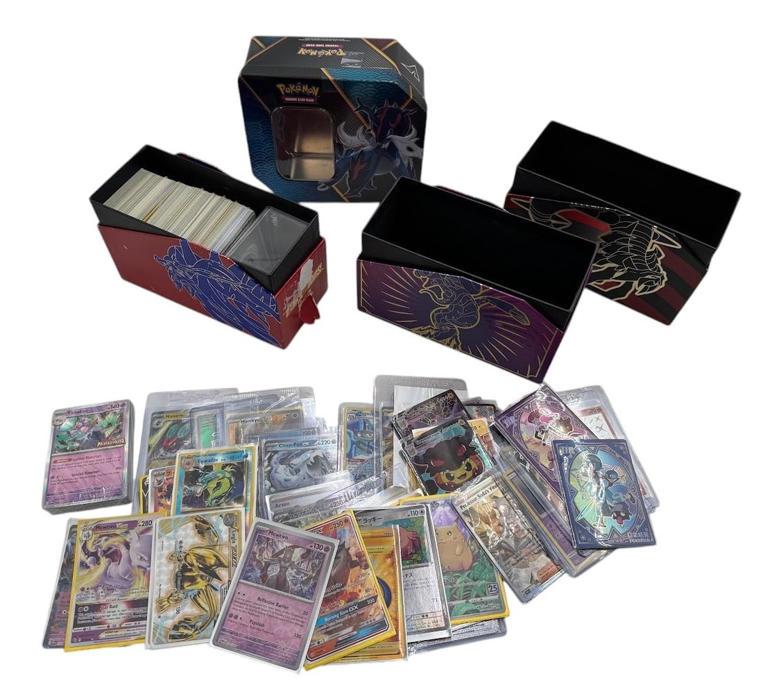 Mixed Lot of Modern Pokemon Trading Cards and Boxes: Mixed Lot of Modern Pokemon Trading Cards and Boxes. Mostly modern common cards, box of Energy cards and empty Pokemon cards.