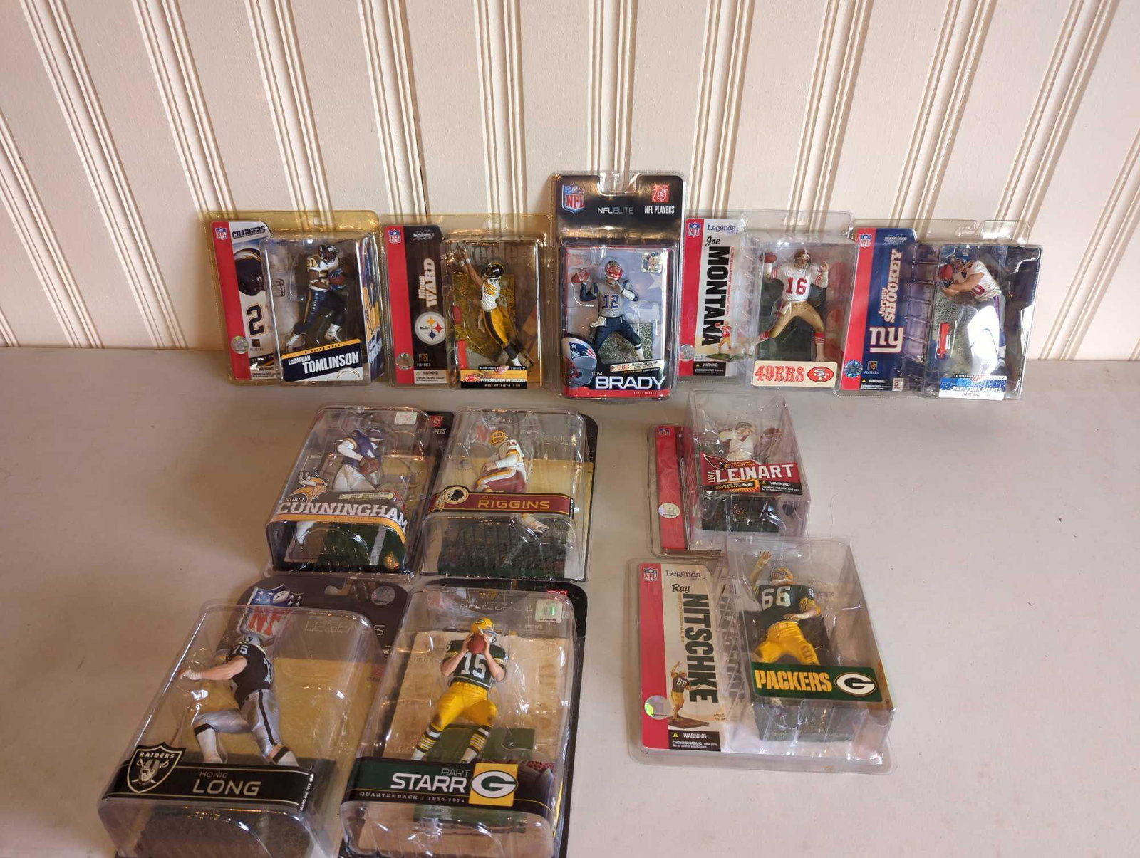 Over 30 NFL Action Figures including Brady: NFL action figures, see photos.