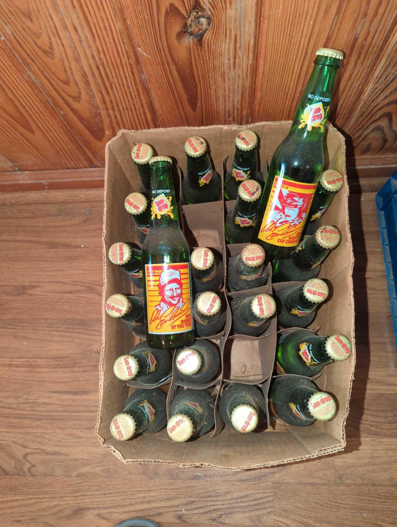 Sun Drop, Pepsi and Coca Cola Bottles: Most are unopened and full of cola, including NASCAR design.