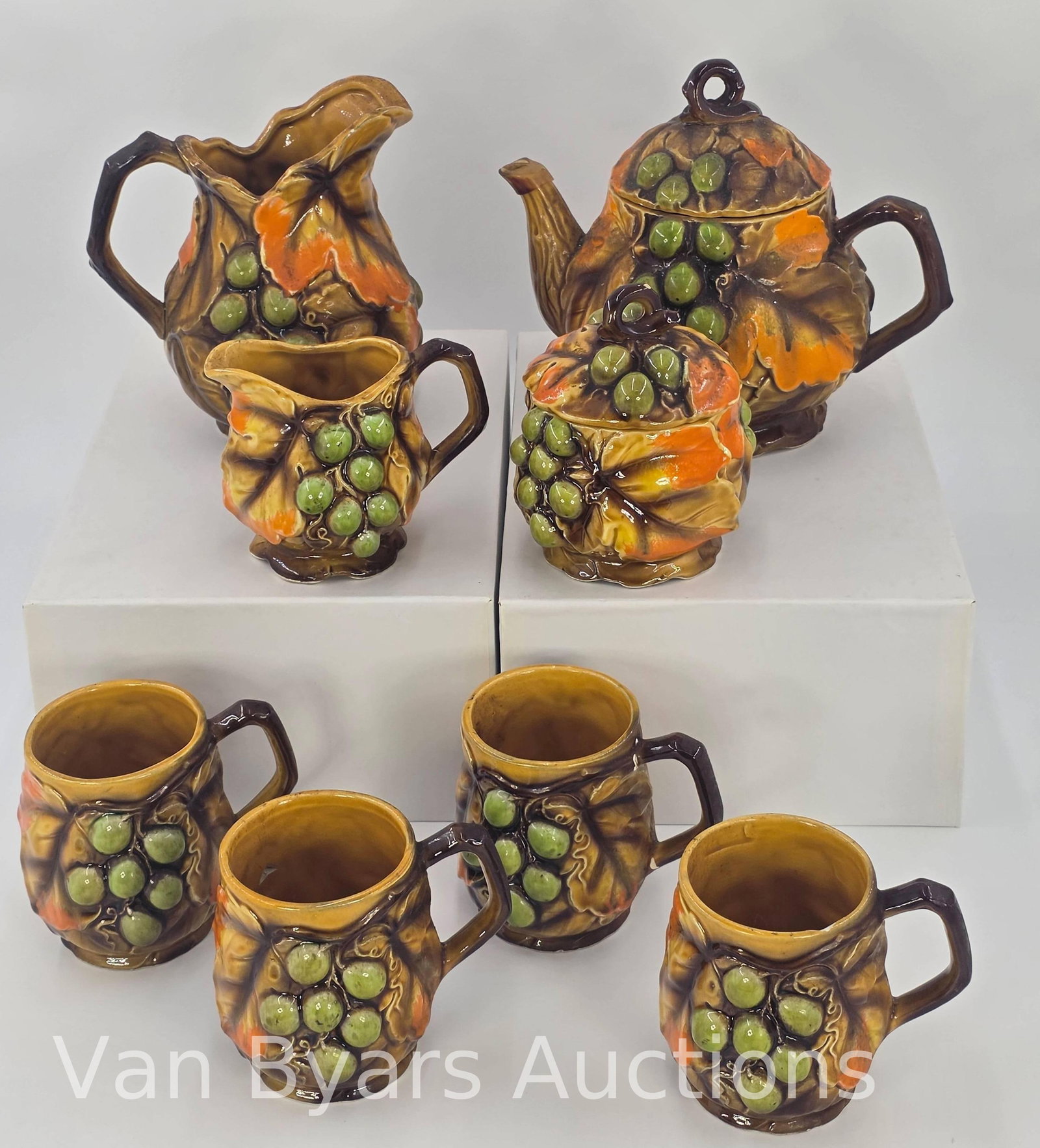 Nasco Swirling Leaves Grapes Tea Set, 10 pieces, INV. 2005: Approx. 6 5/8" height, of kettle to top of lid. With markings.