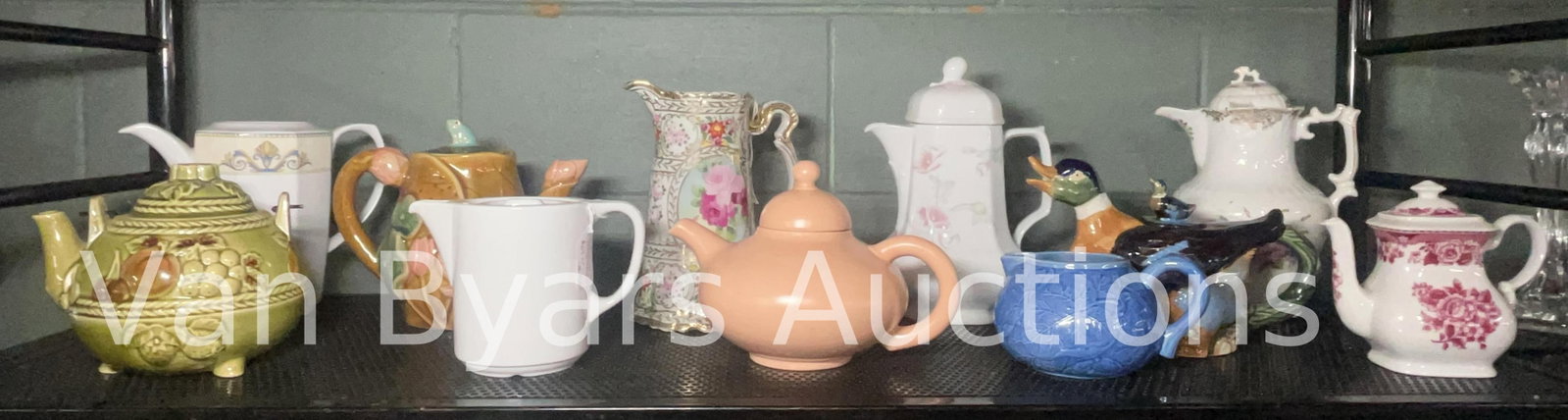 Assorted Tea Pots, INV. 2078: Majolica, Japan, Mitterteich, Pillivuyt, and more. Approx. height of tallest 9 1/2". Some with marking.