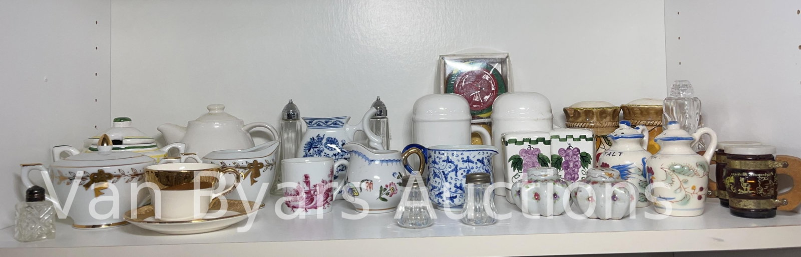Assorted Salt and Pepper Shakers, and Creamers, INV. 2055: Approx. height of tallest shaker 4 5/8".