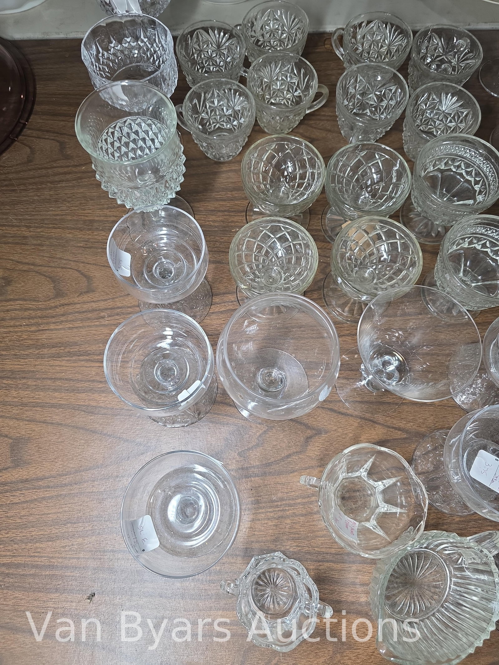 Clear glass stems, pitchers, competes and more. Including Heisey, INV. 2323 - 7