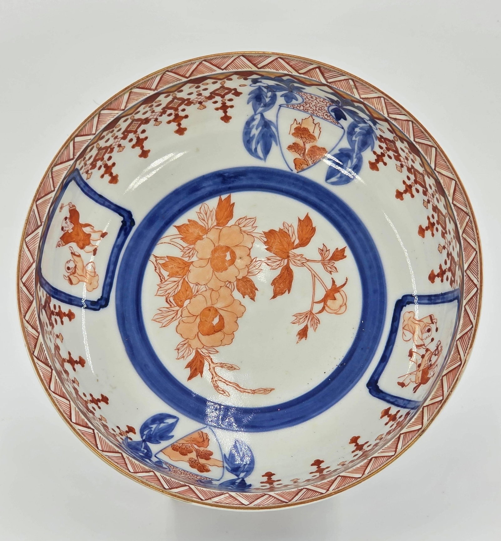 Imari Bowl, INV. 1104: Figural and floral design. Approx. dia. 9.5". With marking.