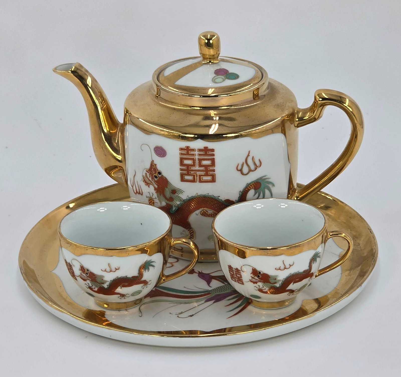 Chinese Wedding Tea Set with Pot, Tray and Cups, Dragon and Phoenix Motifs, INV. 1086: Approx. plate dia. 10", approx. 6" height teapot to lid. Pot and cups with marking.