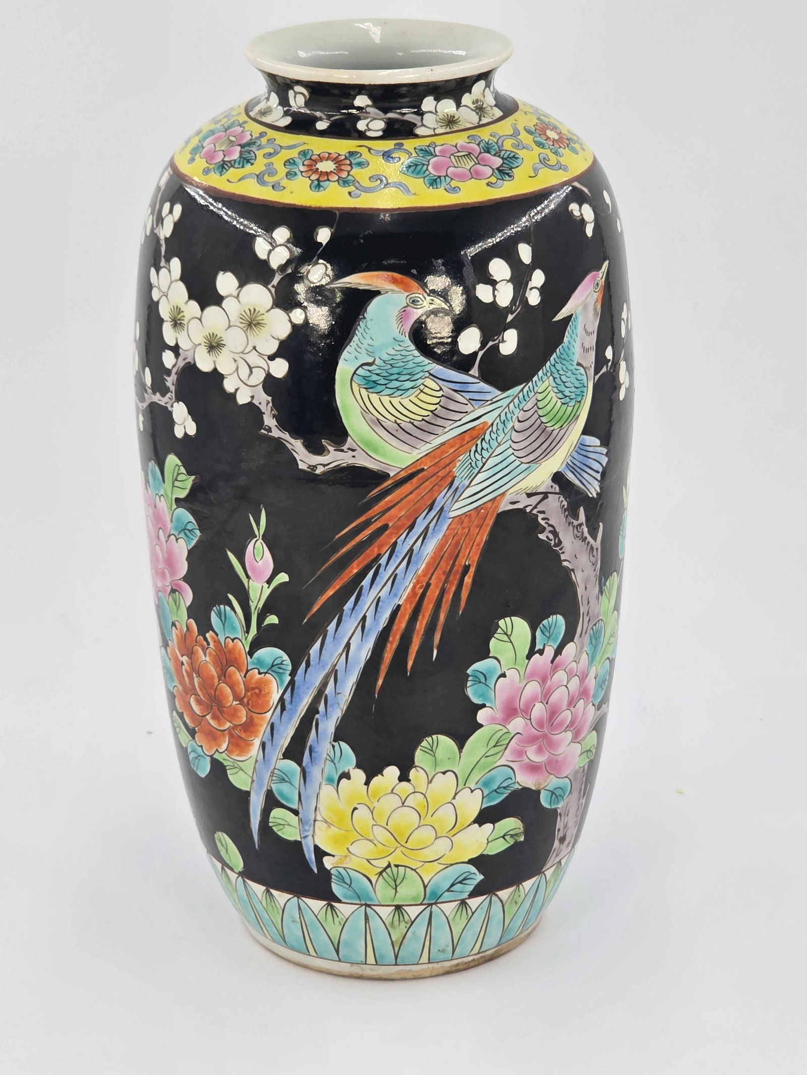 Japanese Famille Noir Porcelain Vase, INV. 1094: Pheasant and floral design. Approx. height 11 5/8" With hold to bottom. With sticker to bottom.