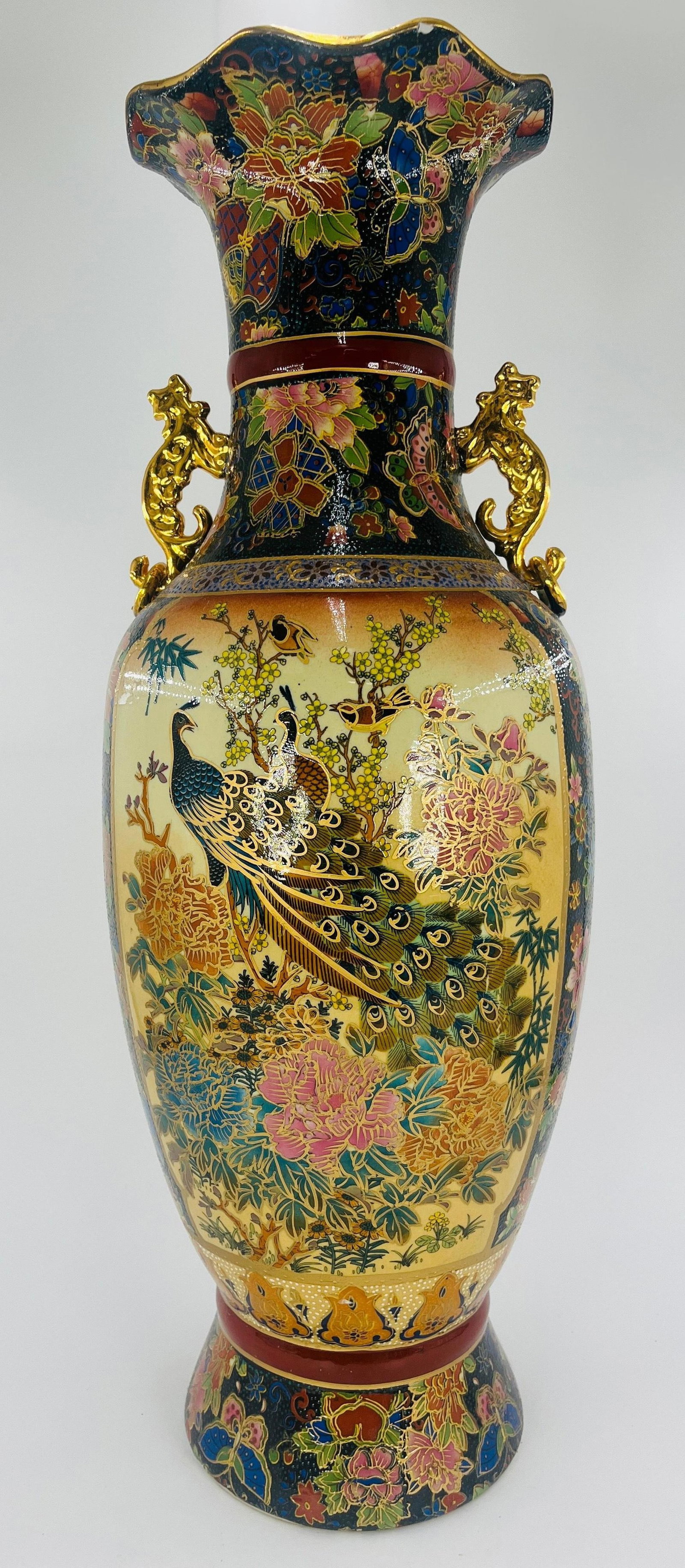 Japanese Royal Satsuma Style Vase, INV. 1150: Peacock, butterfly, floral design, with dragon-shaped handles. Approx. height 23 5/8". With chip and repair to rim.