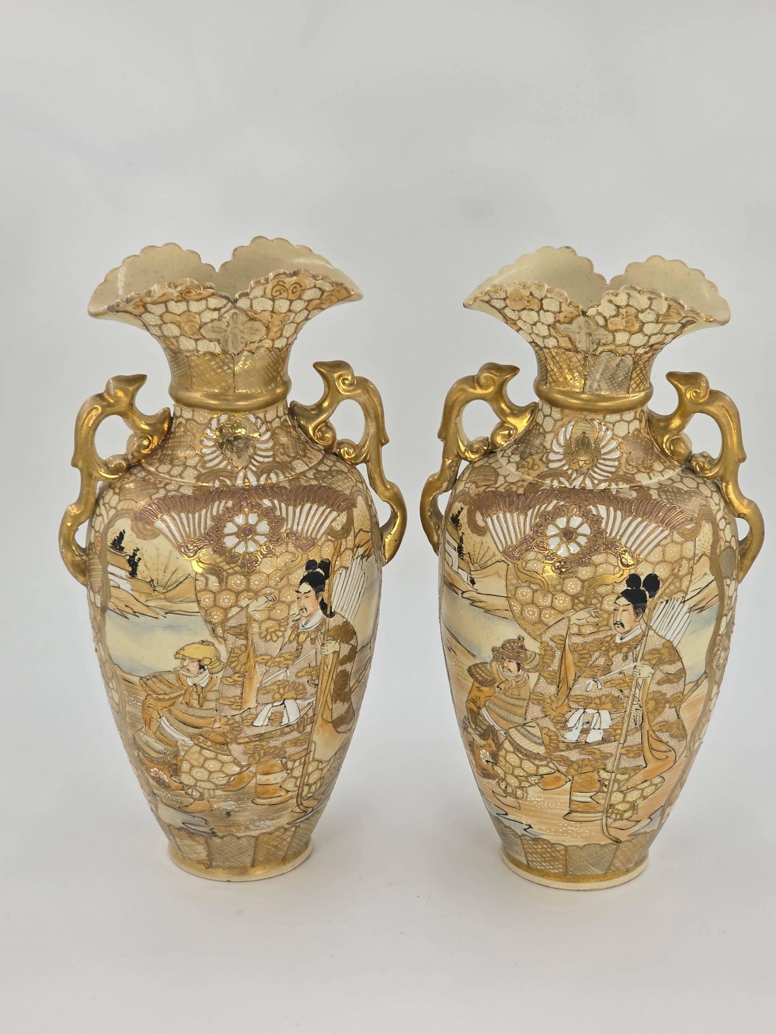 Pair of Japanese Satsuma Vases, INV. 1095: Approx. height 12 3/4". One with lose to glaze to interior of rim.