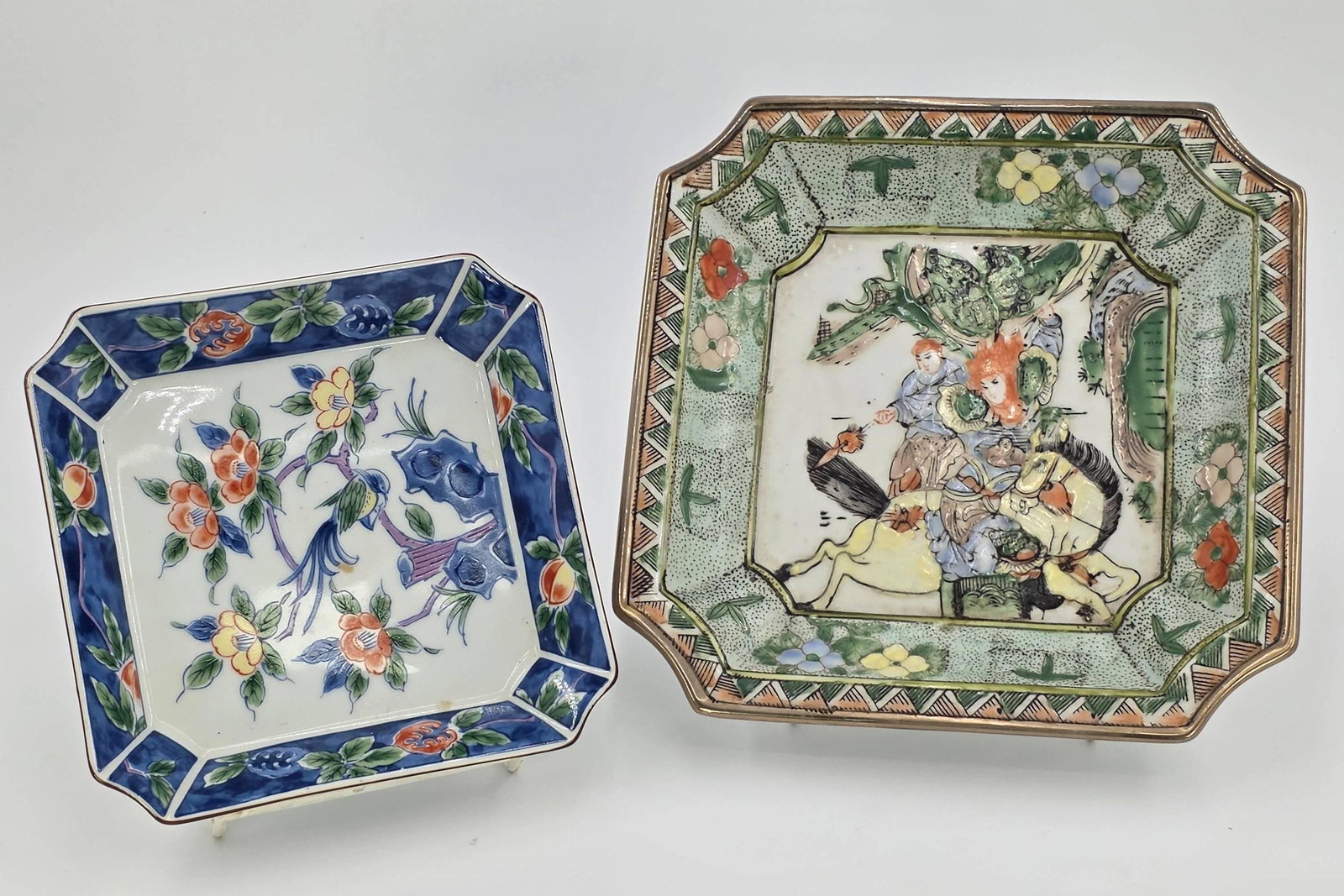 2 Asian Square Plates, incl. Macau with Warriors, and Japanese Floral, INV. 1181: Including Macau with Warriors, and Japanese Floral. Longest width approx. 8". With marking.