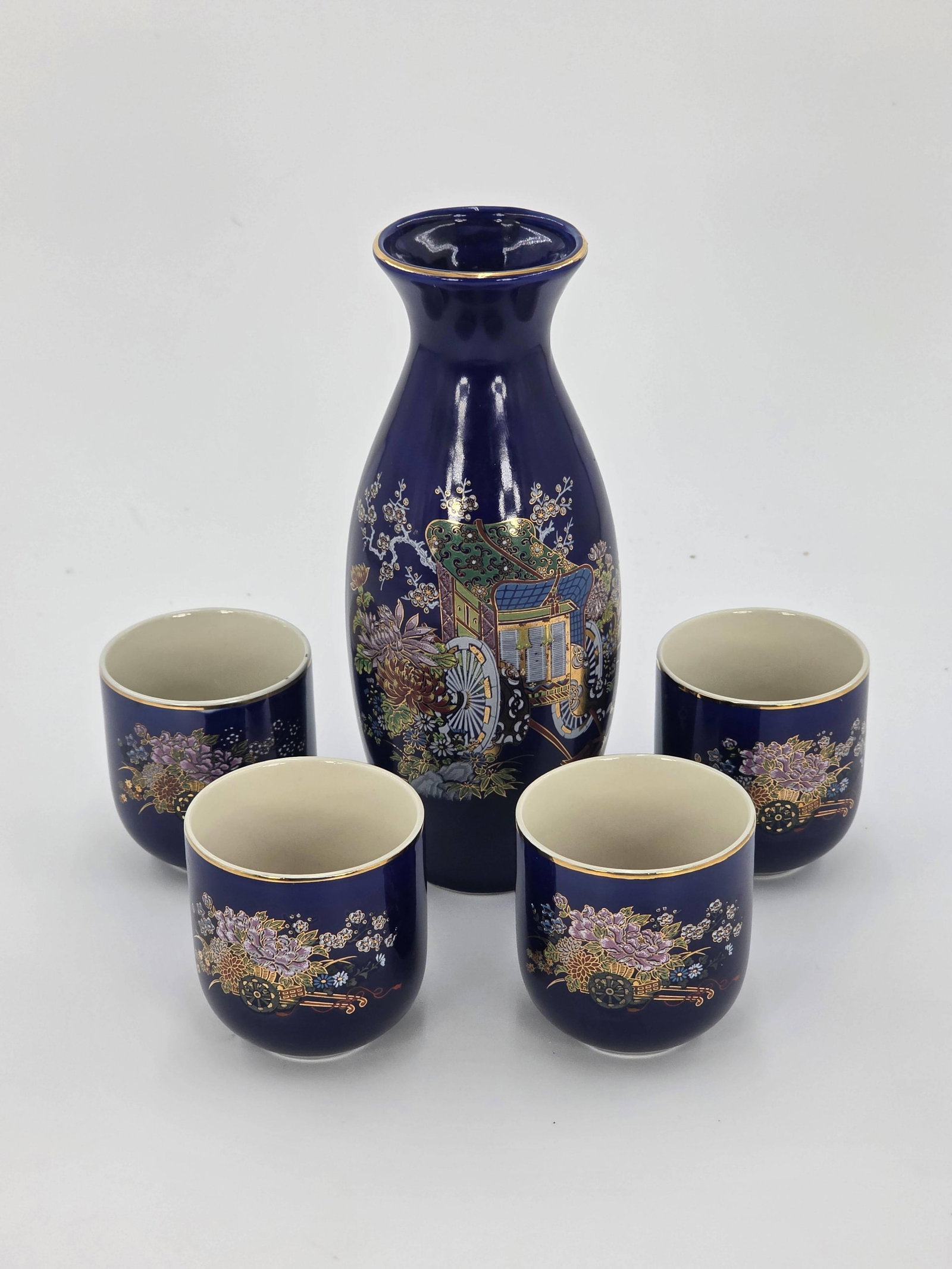 Japanese Cobalt Blue Kutani Style Vase and Cups, INV. 1091: Approx. vase height 8 1/8", cup height 2 3/4". With marking to all.