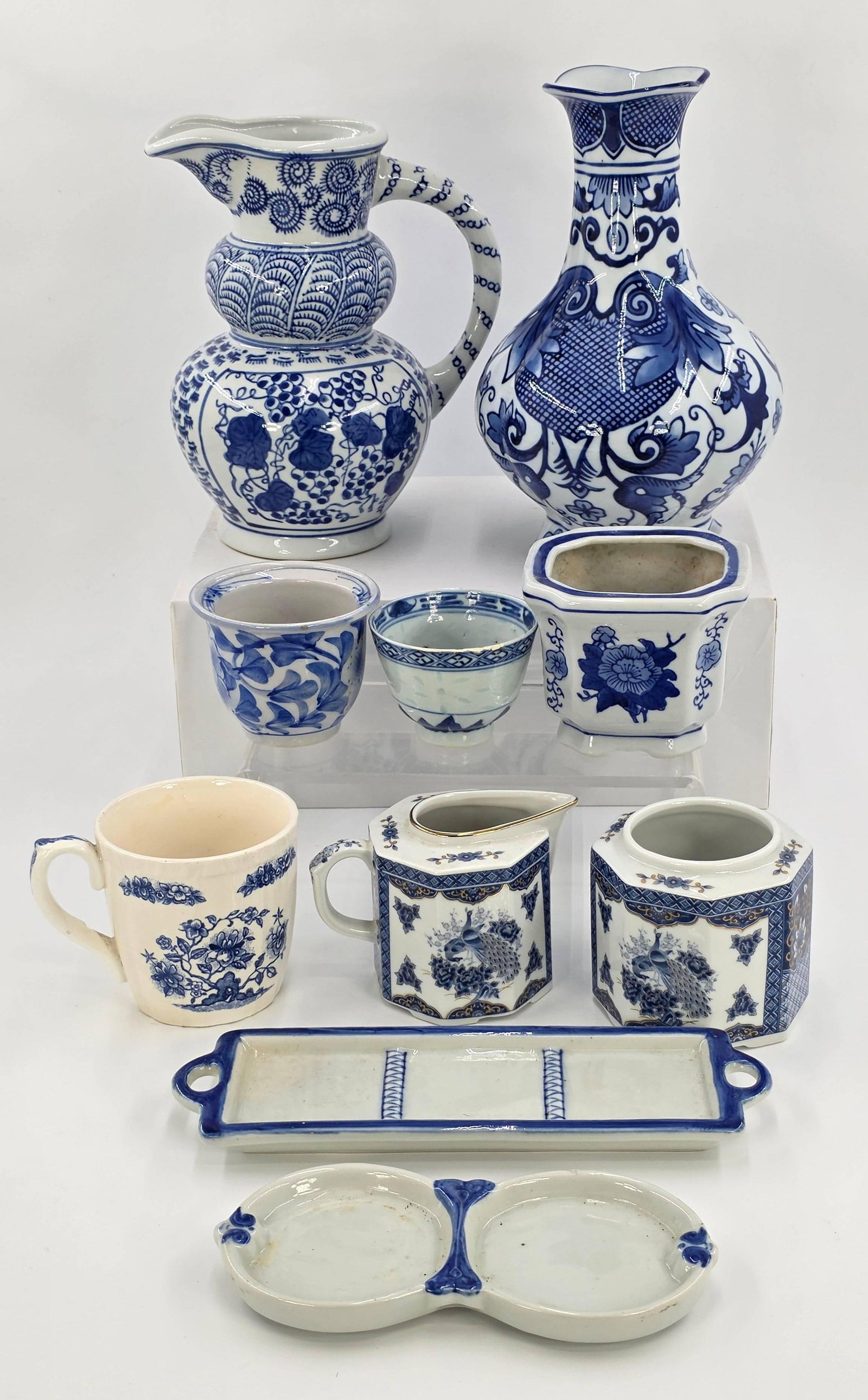 Blue and White Assortment, incl. Andrea by Sadek, Seymour Mann, Canton Collection, 10 pieces, INV.: Including Andrea by Sadek Creamer and Sugar Set, Seynour Mann Vase, Canton Collection Two's Company Pitcher. Some with marking.
