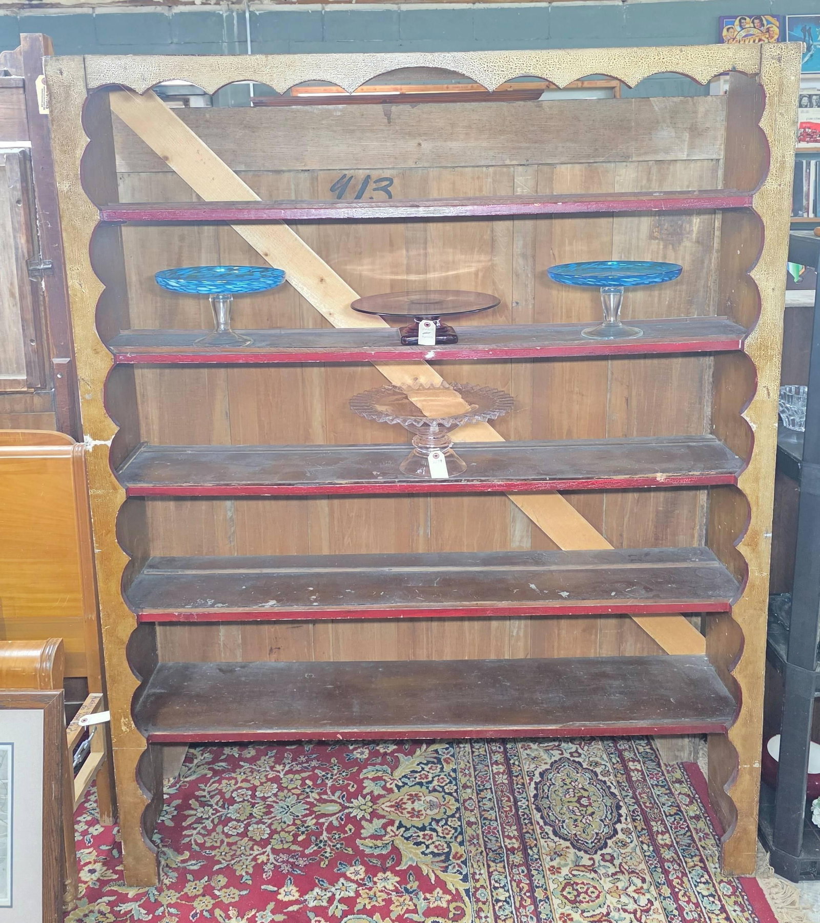 Pennsylvania Dutch Style Open Shelf Bookcase: Contents not included. Approx. 69.5 x 55 x 14 inches.