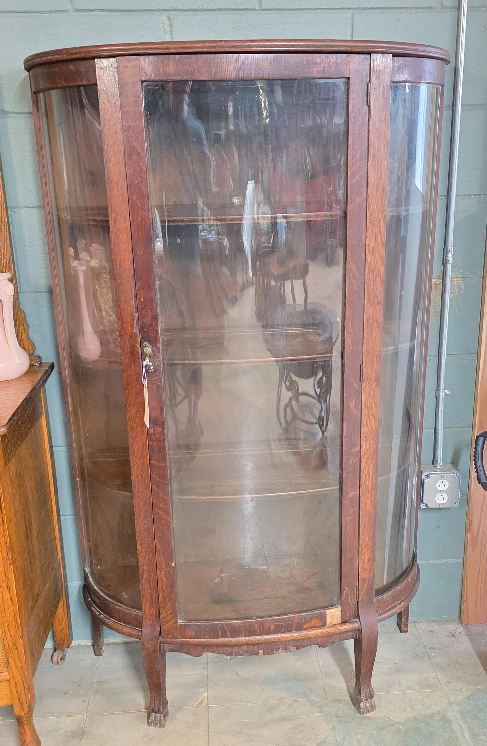 Curved glass China Cabinet, INV. 3003: Not including contents. Approx. 60.25 x 36 x 13.5 inches.